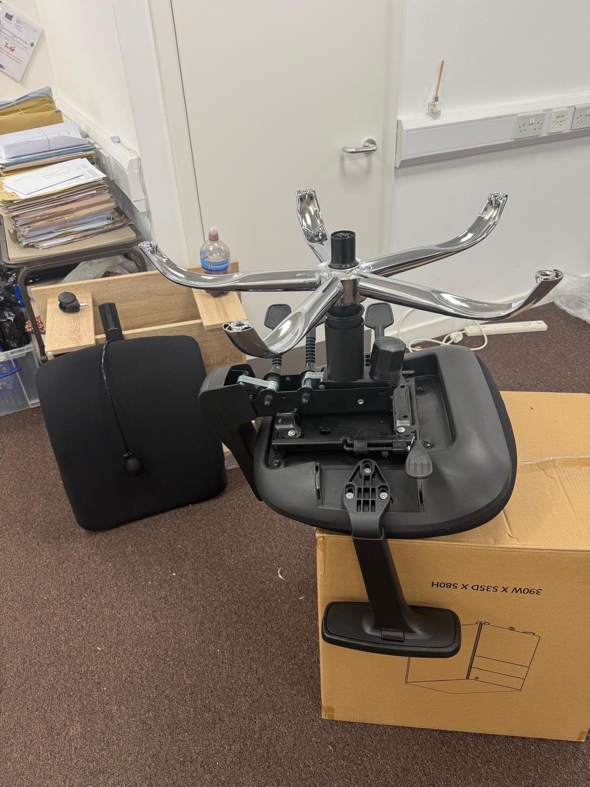 Task chair being assembled during the Mullans Law Accountants installation